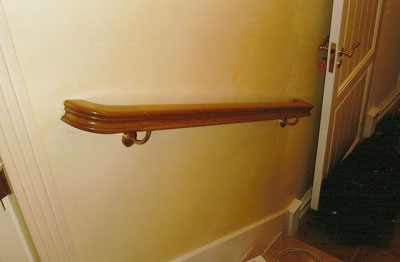 Wall handrail section with HT fittings to return th handrail to the wall